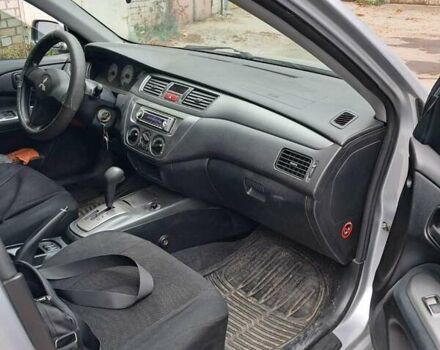 Сірий Міцубісі Lancer, об'ємом двигуна 1.6 л та пробігом 122 тис. км за 5500 $, фото 4 на Automoto.ua