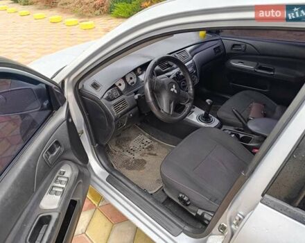 Серый Мицубиси Лансер, объемом двигателя 1.6 л и пробегом 268 тыс. км за 2900 $, фото 5 на Automoto.ua