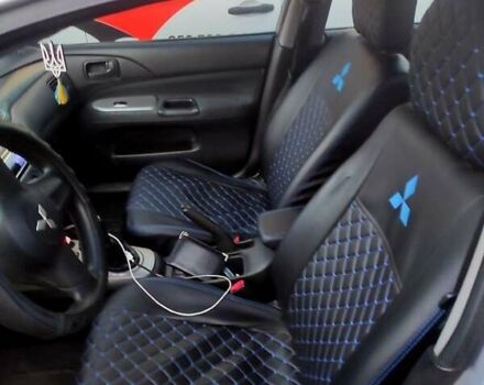 Серый Мицубиси Лансер, объемом двигателя 1.6 л и пробегом 302 тыс. км за 3200 $, фото 3 на Automoto.ua