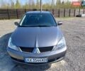 Сірий Міцубісі Lancer, об'ємом двигуна 1.58 л та пробігом 260 тис. км за 4000 $, фото 7 на Automoto.ua
