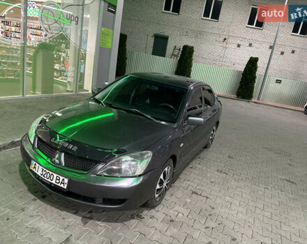 Серый Мицубиси Лансер, объемом двигателя 1.6 л и пробегом 112 тыс. км за 2800 $, фото 12 на Automoto.ua