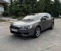 Серый Мицубиси Лансер, объемом двигателя 1.5 л и пробегом 190 тыс. км за 4390 $, фото 1 на Automoto.ua
