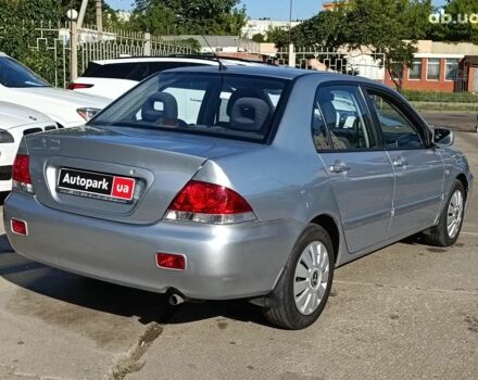 Сірий Міцубісі Lancer, об'ємом двигуна 1.6 л та пробігом 222 тис. км за 3990 $, фото 7 на Automoto.ua