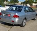 Сірий Міцубісі Lancer, об'ємом двигуна 1.6 л та пробігом 222 тис. км за 3990 $, фото 7 на Automoto.ua
