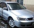 Сірий Міцубісі Lancer, об'ємом двигуна 1.6 л та пробігом 219 тис. км за 4400 $, фото 16 на Automoto.ua