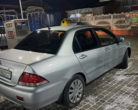 Сірий Міцубісі Lancer, об'ємом двигуна 1.58 л та пробігом 244 тис. км за 4500 $, фото 2 на Automoto.ua