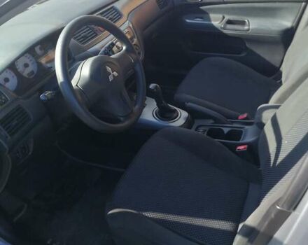 Сірий Міцубісі Lancer, об'ємом двигуна 1.6 л та пробігом 142 тис. км за 4700 $, фото 6 на Automoto.ua