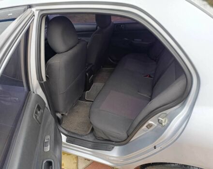 Серый Мицубиси Лансер, объемом двигателя 1.6 л и пробегом 238 тыс. км за 2900 $, фото 4 на Automoto.ua