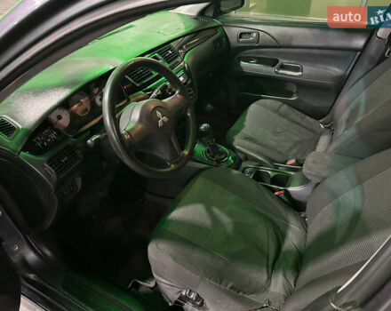 Серый Мицубиси Лансер, объемом двигателя 1.6 л и пробегом 112 тыс. км за 2800 $, фото 14 на Automoto.ua