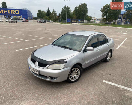 Мицубиси Лансер 2007 в Житомире на Automoto.ua Серый Мицубиси Лансер, объемом двигателя 1.6 л и пробегом 281 тыс. км за 3500 $, фото 8 на Automoto.ua