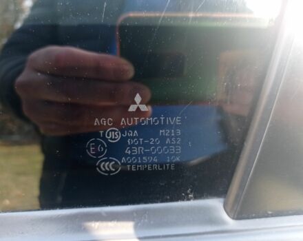 Серый Мицубиси Лансер, объемом двигателя 2 л и пробегом 180 тыс. км за 5800 $, фото 2 на Automoto.ua