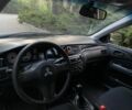 Серый Мицубиси Лансер, объемом двигателя 1.6 л и пробегом 250 тыс. км за 3999 $, фото 6 на Automoto.ua