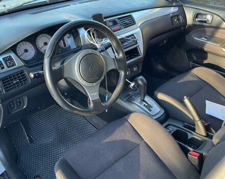 Мицубиси Лансер 2007 в Василькове на Automoto.ua Серый Мицубиси Лансер, объемом двигателя 2 л и пробегом 177 тыс. км за 5399 $, фото 13 на Automoto.ua