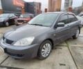 Сірий Міцубісі Lancer, об'ємом двигуна 1.6 л та пробігом 158 тис. км за 6390 $, фото 1 на Automoto.ua