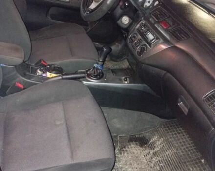 Серый Мицубиси Лансер, объемом двигателя 1.6 л и пробегом 308 тыс. км за 3800 $, фото 4 на Automoto.ua