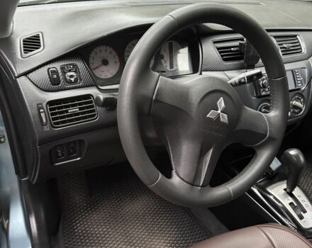 Серый Мицубиси Лансер, объемом двигателя 1.6 л и пробегом 238 тыс. км за 4300 $, фото 12 на Automoto.ua