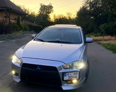 Серый Мицубиси Лансер, объемом двигателя 2 л и пробегом 220 тыс. км за 6500 $, фото 5 на Automoto.ua