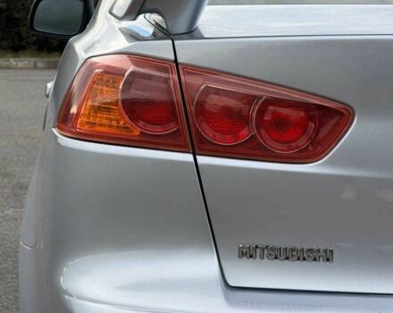 Серый Мицубиси Лансер, объемом двигателя 2 л и пробегом 207 тыс. км за 5800 $, фото 10 на Automoto.ua