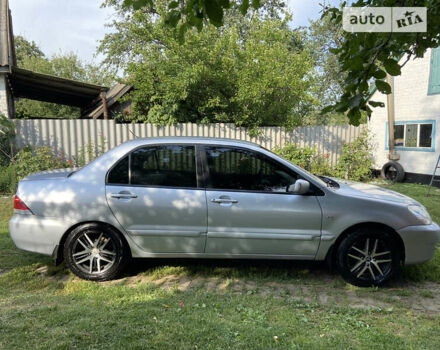 Сірий Міцубісі Lancer, об'ємом двигуна 1.6 л та пробігом 250 тис. км за 5500 $, фото 5 на Automoto.ua