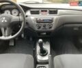 Сірий Міцубісі Lancer, об'ємом двигуна 1.59 л та пробігом 44 тис. км за 6200 $, фото 19 на Automoto.ua