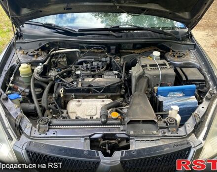 Серый Мицубиси Лансер, объемом двигателя 1.6 л и пробегом 212 тыс. км за 4600 $, фото 10 на Automoto.ua