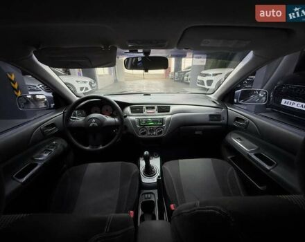 Серый Мицубиси Лансер, объемом двигателя 1.58 л и пробегом 271 тыс. км за 4200 $, фото 28 на Automoto.ua