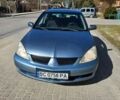 Серый Мицубиси Лансер, объемом двигателя 1.58 л и пробегом 190 тыс. км за 4500 $, фото 1 на Automoto.ua