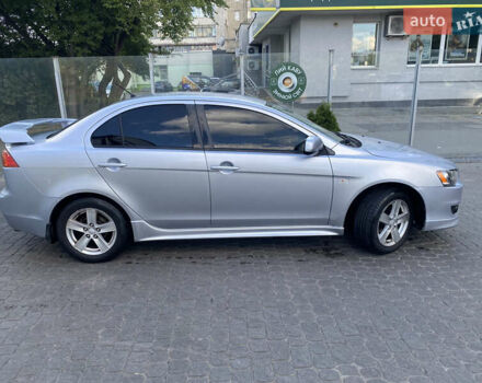 Серый Мицубиси Лансер, объемом двигателя 2 л и пробегом 215 тыс. км за 5750 $, фото 1 на Automoto.ua