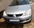 Сірий Міцубісі Lancer, об'ємом двигуна 1.5 л та пробігом 176 тис. км за 2850 $, фото 1 на Automoto.ua