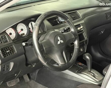 Серый Мицубиси Лансер, объемом двигателя 1.6 л и пробегом 174 тыс. км за 5990 $, фото 7 на Automoto.ua