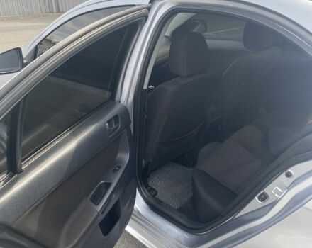 Серый Мицубиси Лансер, объемом двигателя 1.5 л и пробегом 188 тыс. км за 4999 $, фото 6 на Automoto.ua