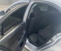 Серый Мицубиси Лансер, объемом двигателя 1.5 л и пробегом 188 тыс. км за 4999 $, фото 6 на Automoto.ua