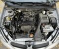 Сірий Міцубісі Lancer, об'ємом двигуна 1.6 л та пробігом 180 тис. км за 2500 $, фото 7 на Automoto.ua