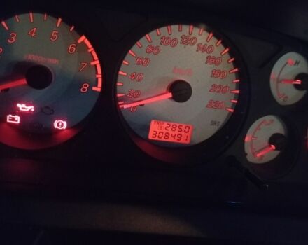 Серый Мицубиси Лансер, объемом двигателя 1.6 л и пробегом 308 тыс. км за 3800 $, фото 6 на Automoto.ua