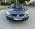 Сірий Міцубісі Lancer, об'ємом двигуна 1.6 л та пробігом 189 тис. км за 6200 $, фото 7 на Automoto.ua