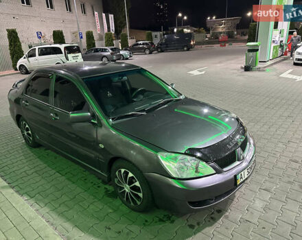 Серый Мицубиси Лансер, объемом двигателя 1.6 л и пробегом 112 тыс. км за 2800 $, фото 9 на Automoto.ua