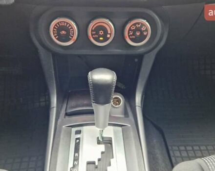 Серый Мицубиси Лансер, объемом двигателя 2 л и пробегом 213 тыс. км за 6550 $, фото 22 на Automoto.ua