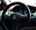 Серый Мицубиси Лансер, объемом двигателя 1.6 л и пробегом 335 тыс. км за 4500 $, фото 16 на Automoto.ua