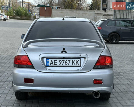 Серый Мицубиси Лансер, объемом двигателя 1.6 л и пробегом 200 тыс. км за 3900 $, фото 2 на Automoto.ua