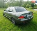 Сірий Міцубісі Lancer, об'ємом двигуна 1.58 л та пробігом 220 тис. км за 4500 $, фото 6 на Automoto.ua
