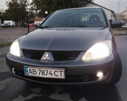 Сірий Міцубісі Lancer, об'ємом двигуна 1.6 л та пробігом 178 тис. км за 5464 $, фото 11 на Automoto.ua