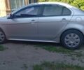 Серый Мицубиси Лансер, объемом двигателя 1.5 л и пробегом 210 тыс. км за 6100 $, фото 2 на Automoto.ua