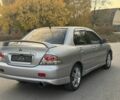 Серый Мицубиси Лансер, объемом двигателя 2 л и пробегом 185 тыс. км за 4600 $, фото 4 на Automoto.ua