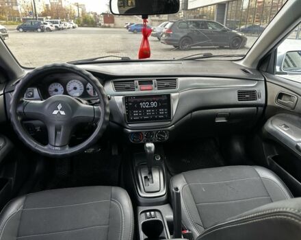 Сірий Міцубісі Lancer, об'ємом двигуна 1.6 л та пробігом 200 тис. км за 3900 $, фото 9 на Automoto.ua