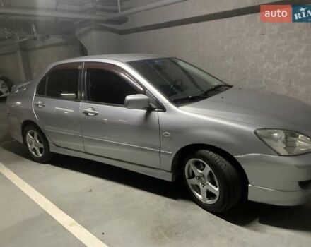 Серый Мицубиси Лансер, объемом двигателя 1.6 л и пробегом 196 тыс. км за 3800 $, фото 4 на Automoto.ua