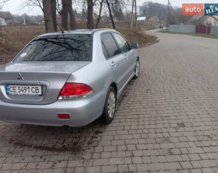 Серый Мицубиси Лансер, объемом двигателя 1.6 л и пробегом 175 тыс. км за 4200 $, фото 9 на Automoto.ua