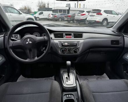 Серый Мицубиси Лансер, объемом двигателя 1.6 л и пробегом 205 тыс. км за 5300 $, фото 10 на Automoto.ua