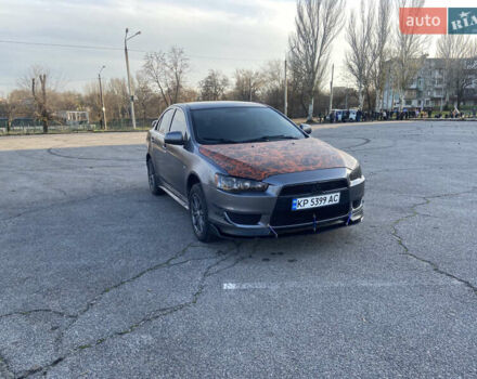 Серый Мицубиси Лансер, объемом двигателя 1.5 л и пробегом 224 тыс. км за 6300 $, фото 2 на Automoto.ua