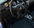 Сірий Міцубісі Lancer, об'ємом двигуна 1.6 л та пробігом 174 тис. км за 4800 $, фото 4 на Automoto.ua