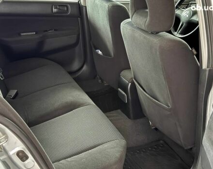 Серый Мицубиси Лансер, объемом двигателя 1.6 л и пробегом 174 тыс. км за 5990 $, фото 10 на Automoto.ua